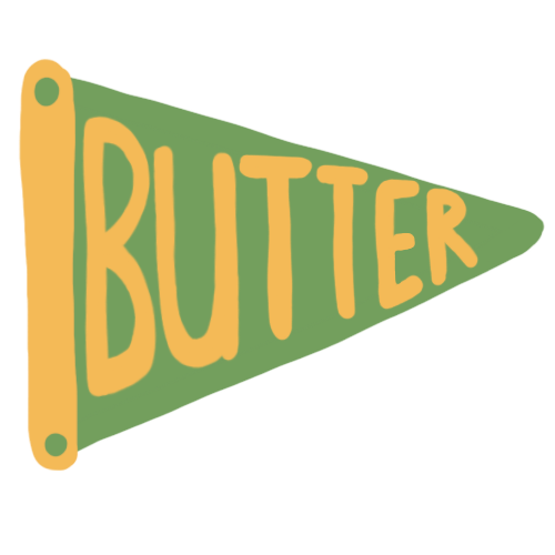 A green and yellow camp flag with the word 'butter' on it